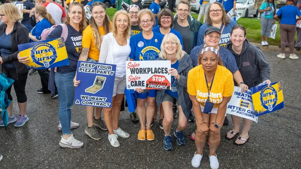 Teamsters Local 2024 nurses rally with signs for fair contracts, safer staffing, and better care.