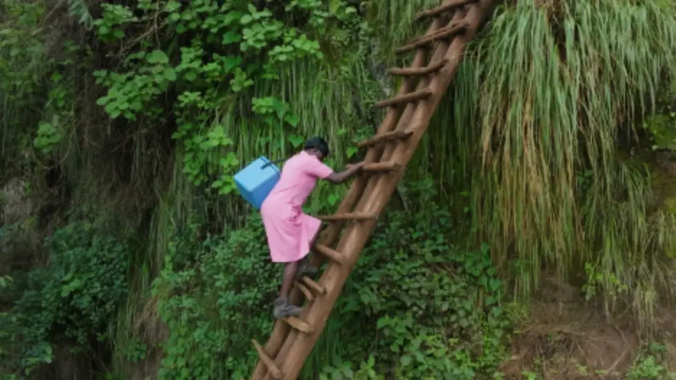 This Nurse Climbs 1,000 Foot Ladders to Deliver Vaccines To Remote Villages
