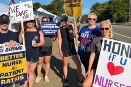 Henry Ford Genesys Hospital in Grand Blanc, Michigan nurses on the strike line holding signs