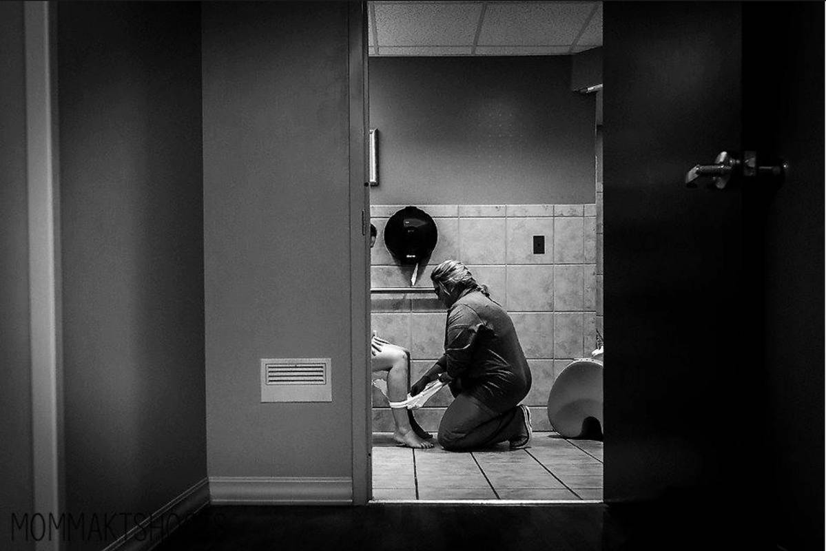 Tender Moment Captured Between Mom and Labor Nurse Goes Viral