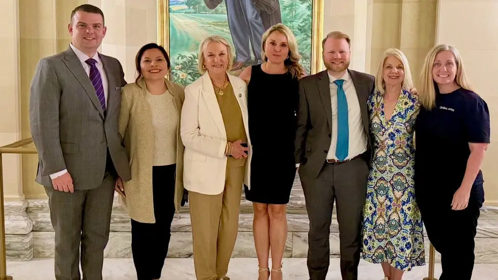 Members of the Oklahoma Nurses Association and legislative supporters stand together at the state capitol to celebrate the override of HB 2298, granting nurse practitioners greater independence.