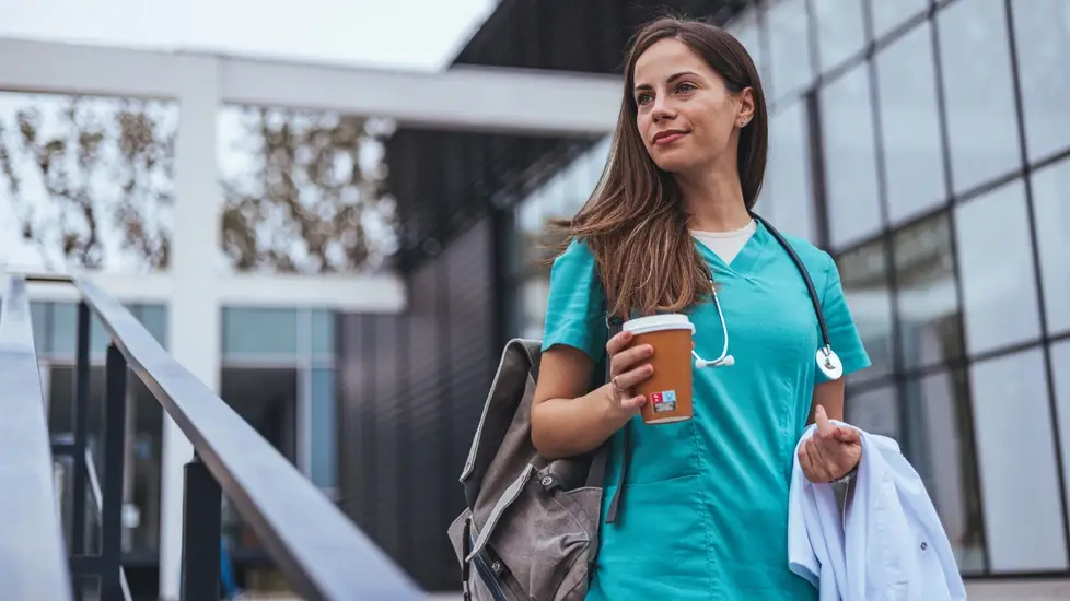 travel nurse leaving shift at hospital
