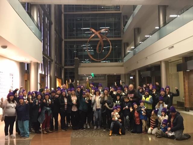 Group of healthcare workers protesting in lobby