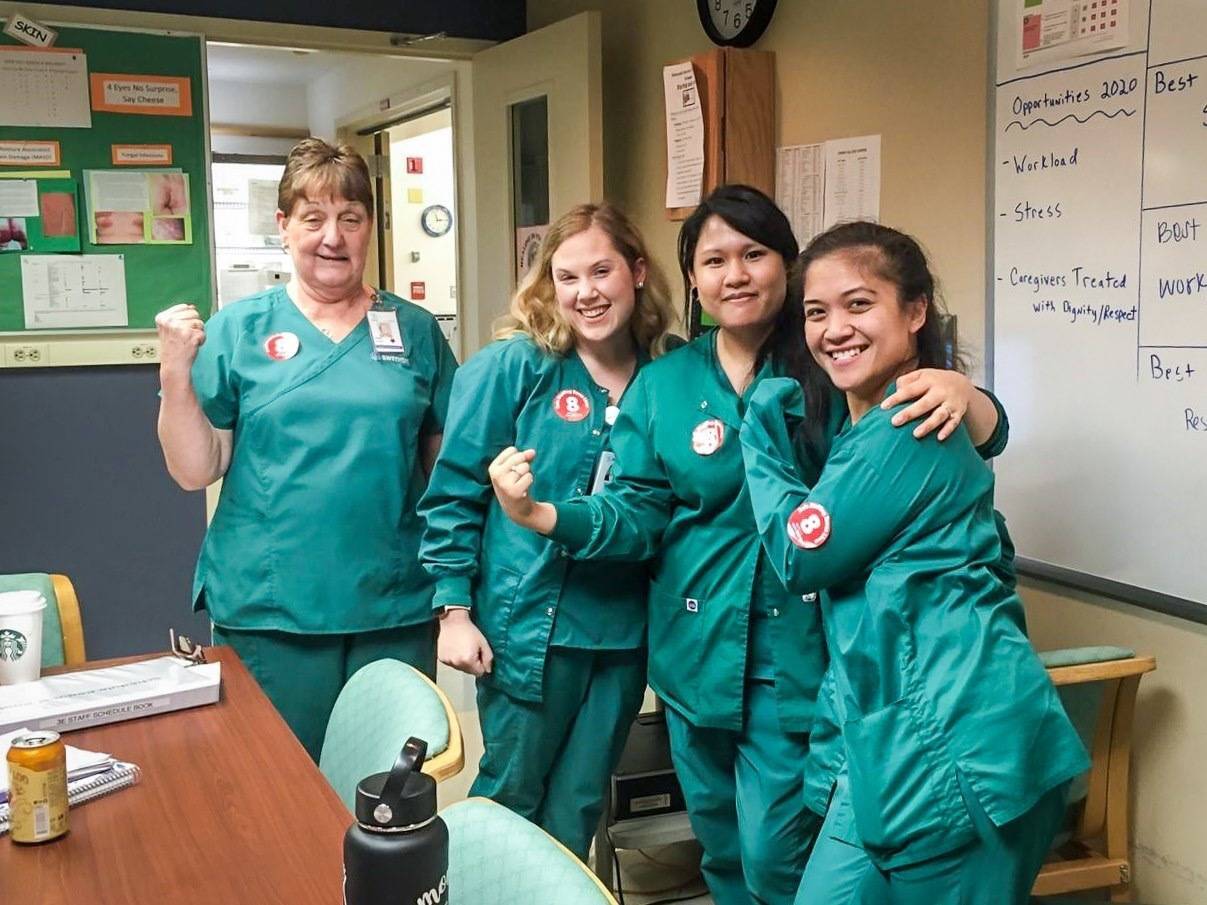 Group of nurses in solidarity in break room